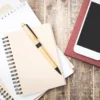 agenda, notitieboek, pen en mobiele telefoon