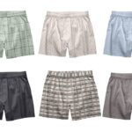 Zes boxershorts in verschillende kleuren en patronen.