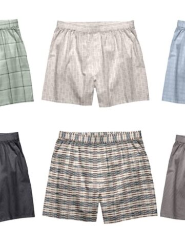 Zes boxershorts in verschillende kleuren en patronen.