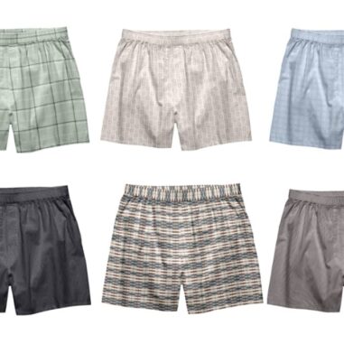 Zes boxershorts in verschillende kleuren en patronen.